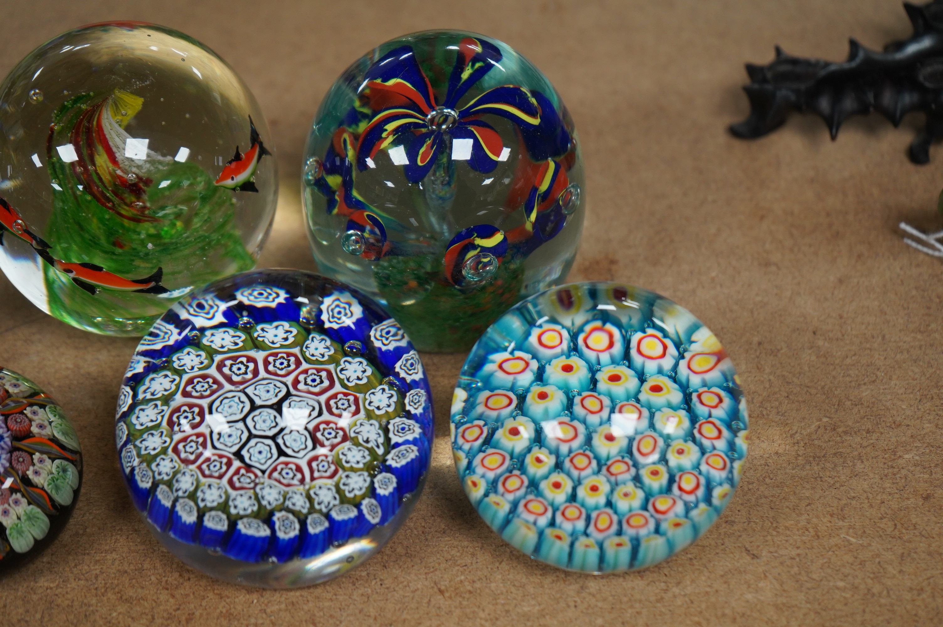 A group of ten paperweights including a ‘scent bottle’ paperweight, 9.5cm. Condition - fair to good